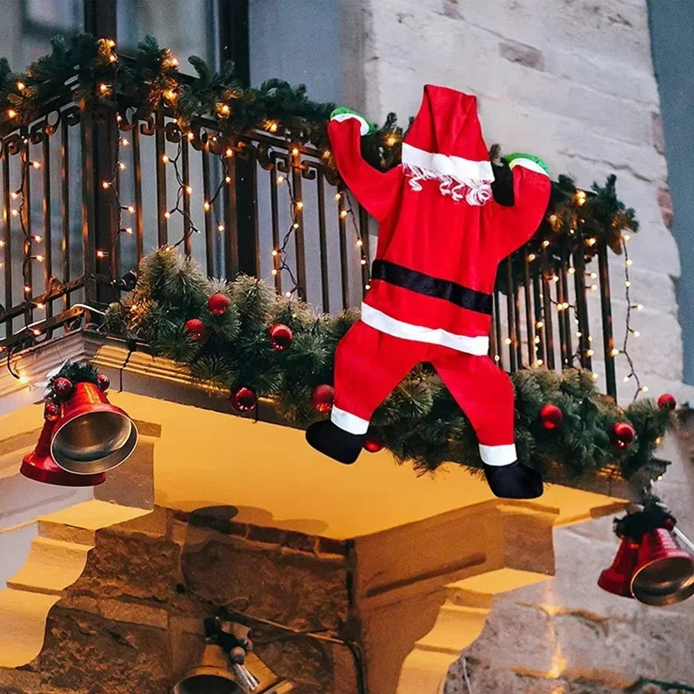 Hanging Santa Claus Decor on a black balcony railing with garland, lights and red bells.