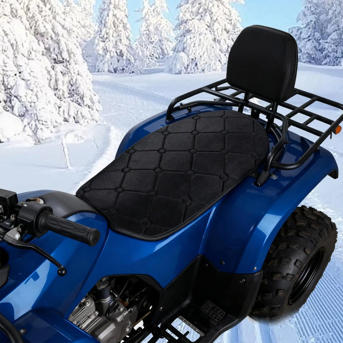 Black Heated Motorcycle Seat Pad installed on a blue ATV in a snowy forest scene