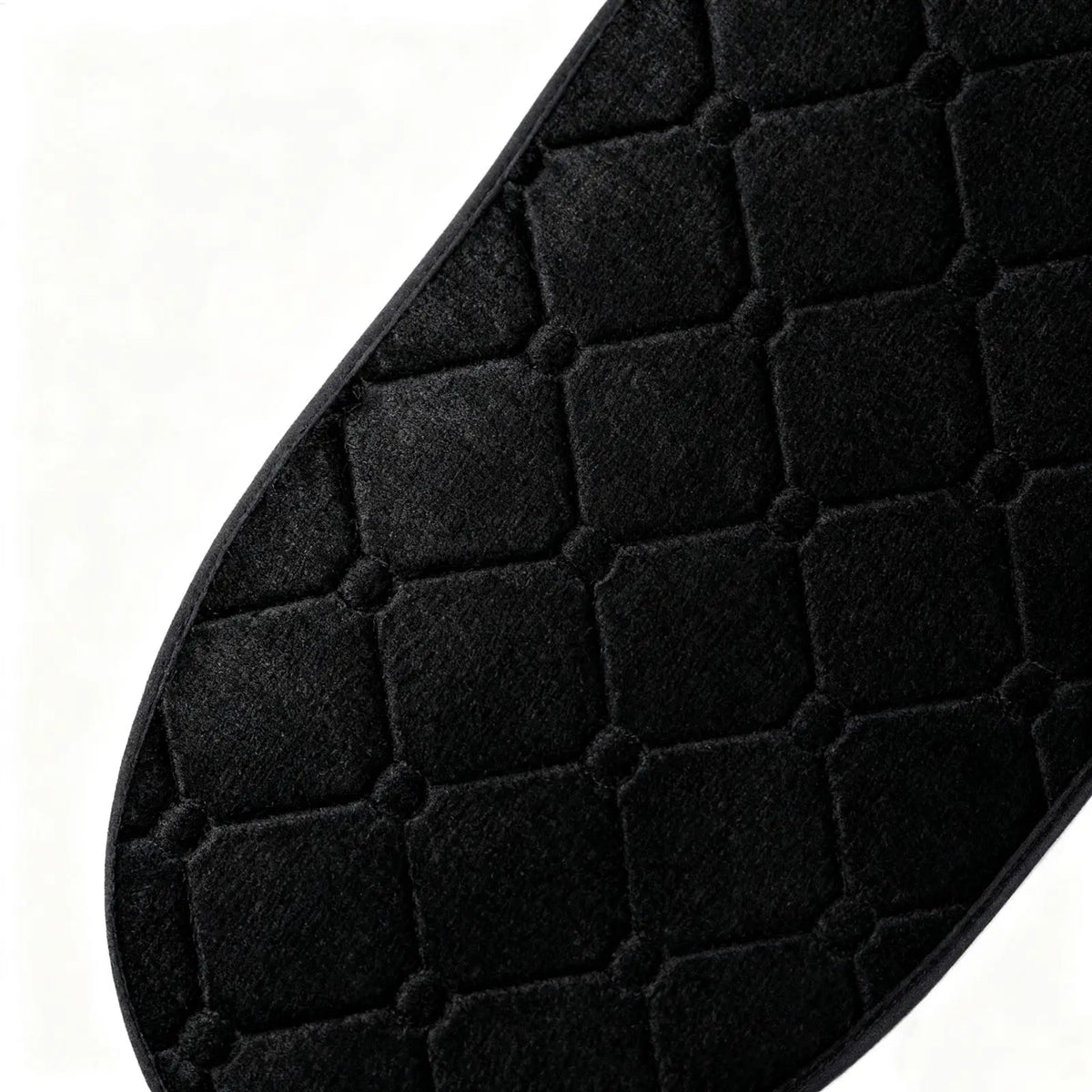 Close-up of the Heated Motorcycle Seat Pad diamond quilting and black edge binding