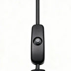 Close-up of the black inline button switch on the Heated Motorcycle Seat Pad USB cable