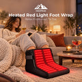 HighPeak Heated Red Light Foot Wrap with glowing red LEDs, worn while relaxing on a sofa.