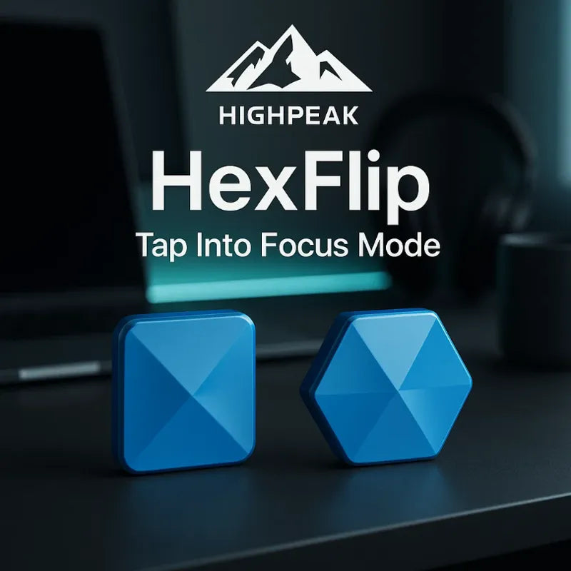 HighPeak HexFlip fidget toys in blue with geometric designs on a black desk near a laptop, promoting focus mode.