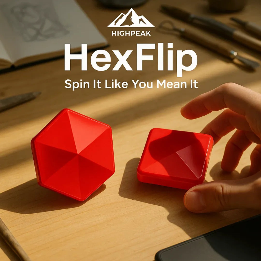 HighPeak HexFlip red precision flipping toys on wood desk with hand about to spin for focus and stress relief