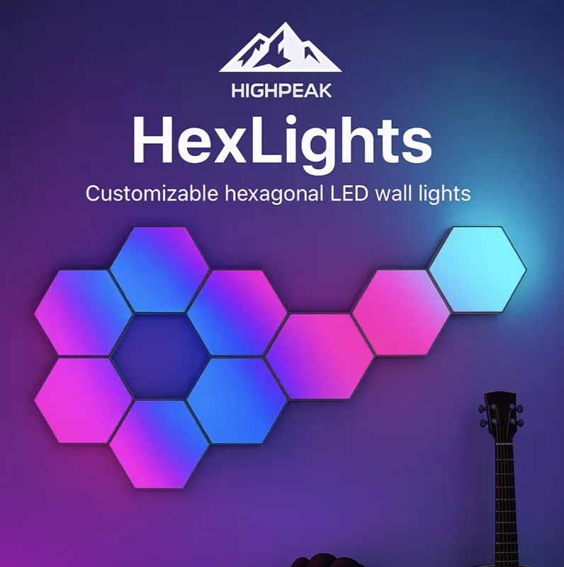 HighPeak HexLights customizable hexagonal LED panels in blue and pink glowing on a wall with a guitar nearby