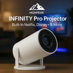 HighPeak Infinity Pro Projector in white, compact design on wooden surface with streaming apps display in background