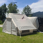 Inflatable Car Camping Tent with its front privacy cover closed and clear upper side panel visible