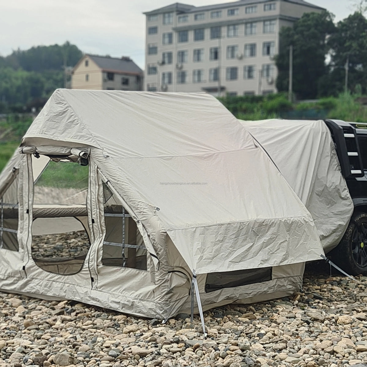Inflatable Car Camping Tent close-up with open doorway and extended cover above the side mesh window