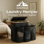 HighPeak 3-Section Laundry Hamper in black with bamboo lid and removable mesh bags in a bedroom setting