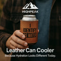HighPeak “I Identify As Water” Leather Can Cooler in brown faux leather held by a person wearing dark clothing