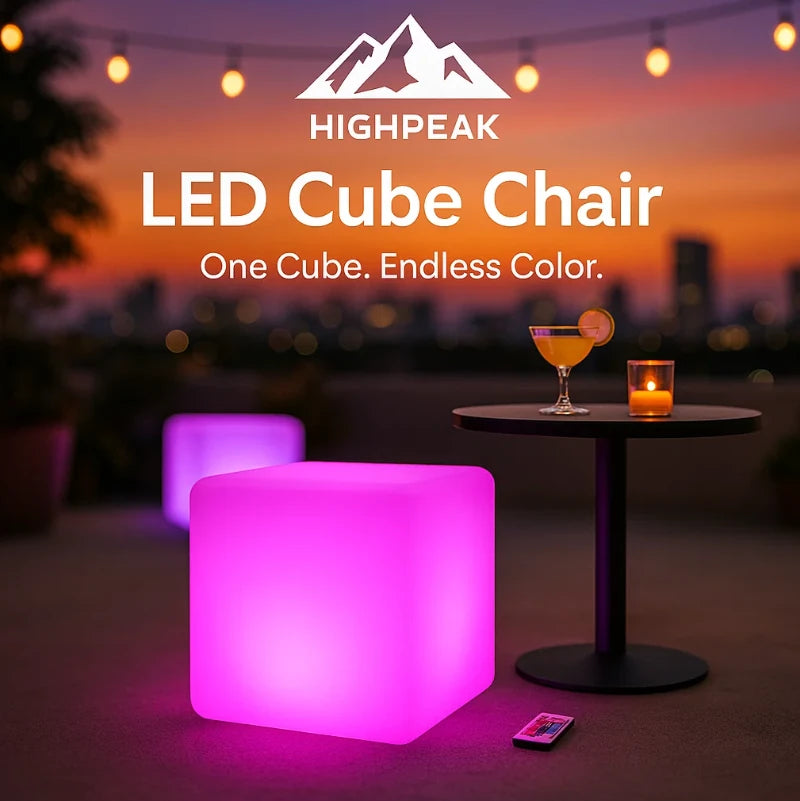 HighPeak LED Cube Chair glowing pink as modern side table with remote on outdoor patio at sunset ambiance