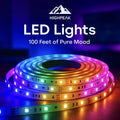 HighPeak LED Lights - 100 Feet multicolor strip coiled on a surface, showcasing vibrant customizable lighting effects.