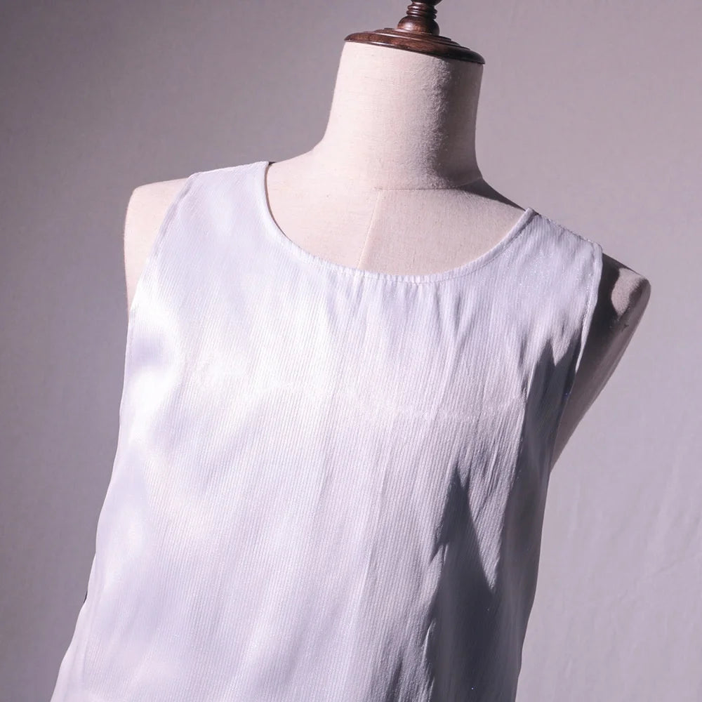 LED Party Tank Top — Unlit white fabric and round neckline close-up