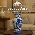 HighPeak LegacyVase micro brick sculpture in blue and white on a table in a cozy living room setting