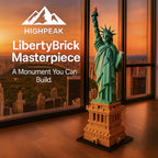 HighPeak LibertyBrick Masterpiece detailed micro brick Statue of Liberty model with pedestal on wooden floor at sunset