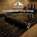 HighPeak LuxeMarble™ Self-Adhesive Vinyl Wrap in black marble finish on kitchen countertop with stove and pot
