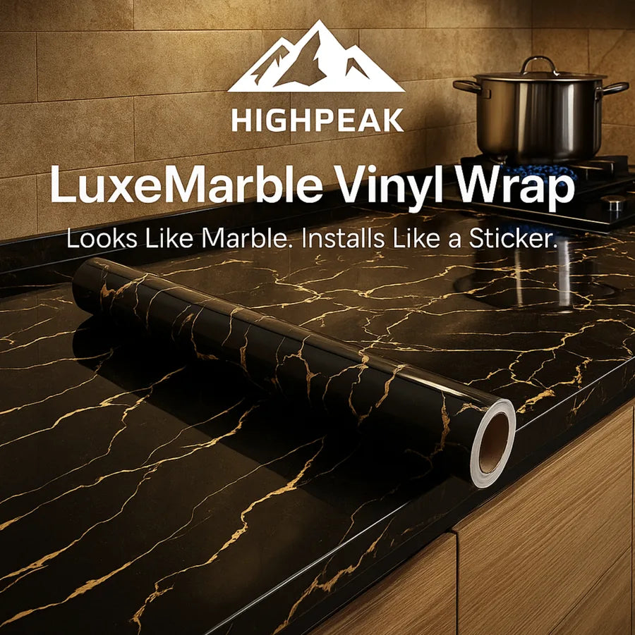HighPeak LuxeMarble™ Self-Adhesive Vinyl Wrap in black marble finish on kitchen countertop with stove and pot