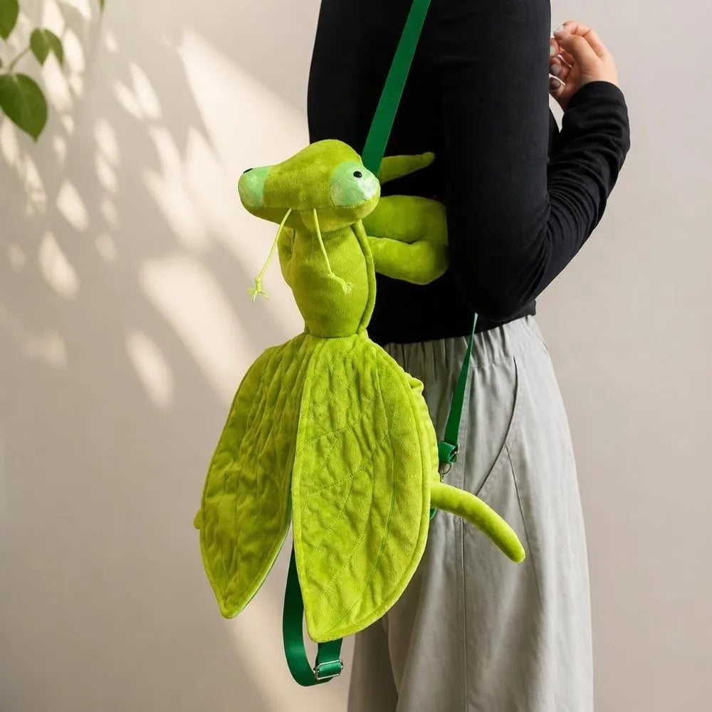 Green Mantis Plush Backpack carried over one shoulder, shown from the side