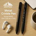 HighPeak Geometric Metal Crinkle Pen set in black on a wooden desk with AirPods and a coffee cup nearby
