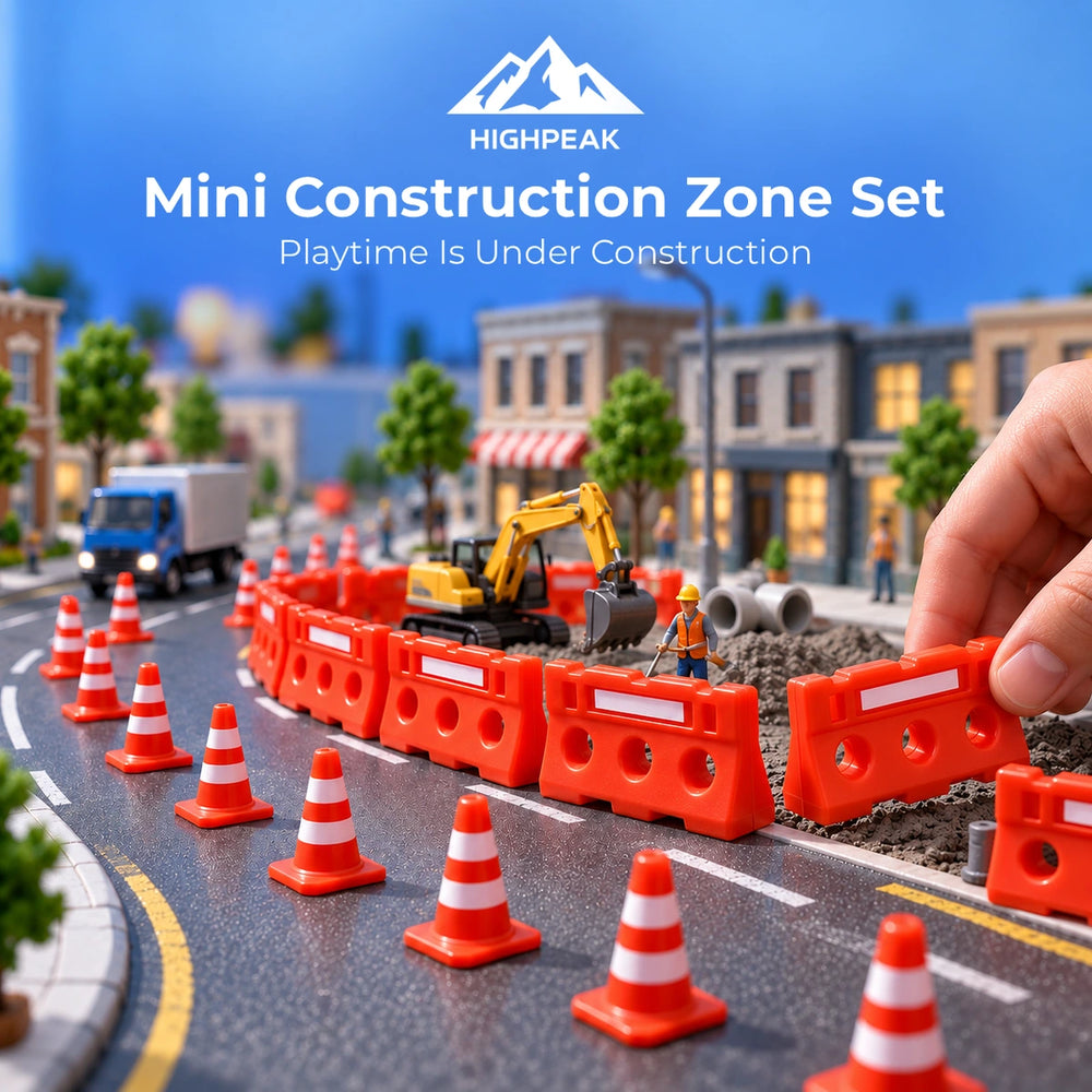 Mini Construction Zone Set with orange cones and barricades as a hand places a barrier in a tabletop city.