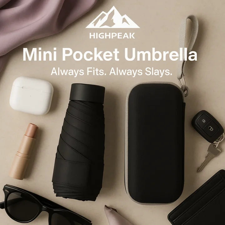 HighPeak Mini Pocket Umbrella in black with hard case, compact and stylish among daily essentials on beige surface