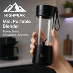 HighPeak Mini Portable Blender in black held in hand, showcasing compact cordless design and stainless steel blades.