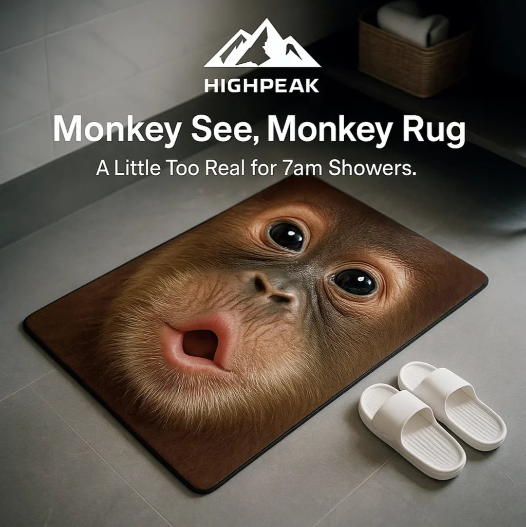 HighPeak Monkey See, Monkey Rug in brown with realistic ape face on bathroom floor next to white slippers, soft microfiber texture
