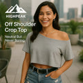 HighPeak Off Shoulder Crop Top in light gray worn by smiling woman outdoors showing casual summer style