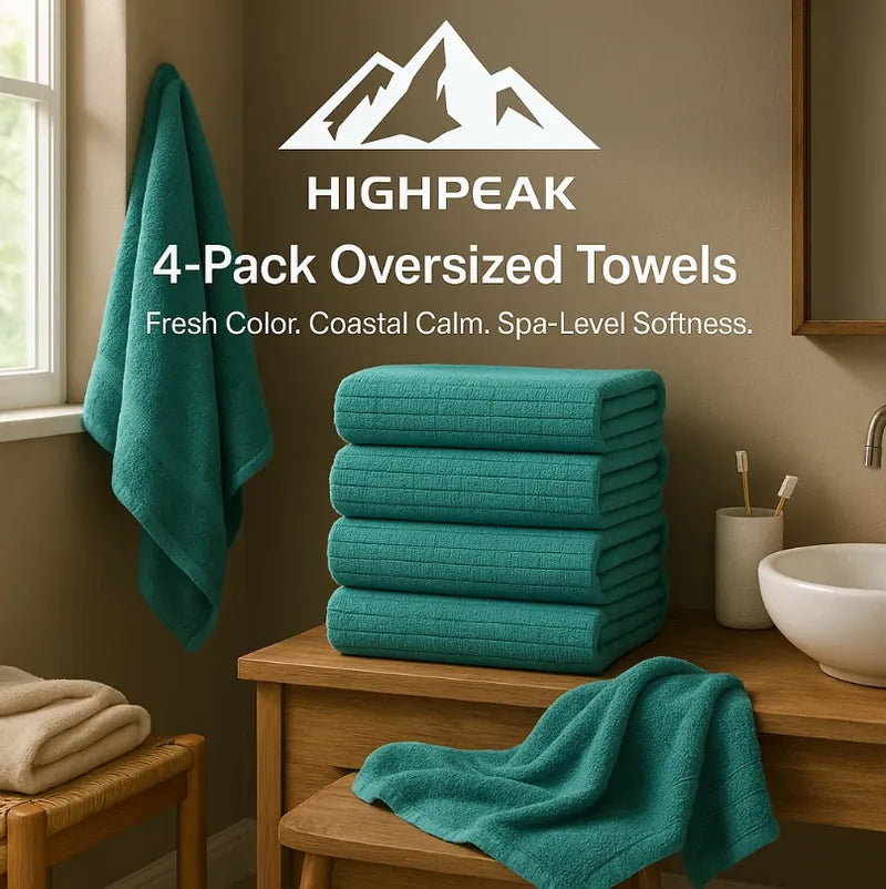 HighPeak 4-Pack Oversized Towels in coastal teal stacked and hanging in a bright bathroom with natural light