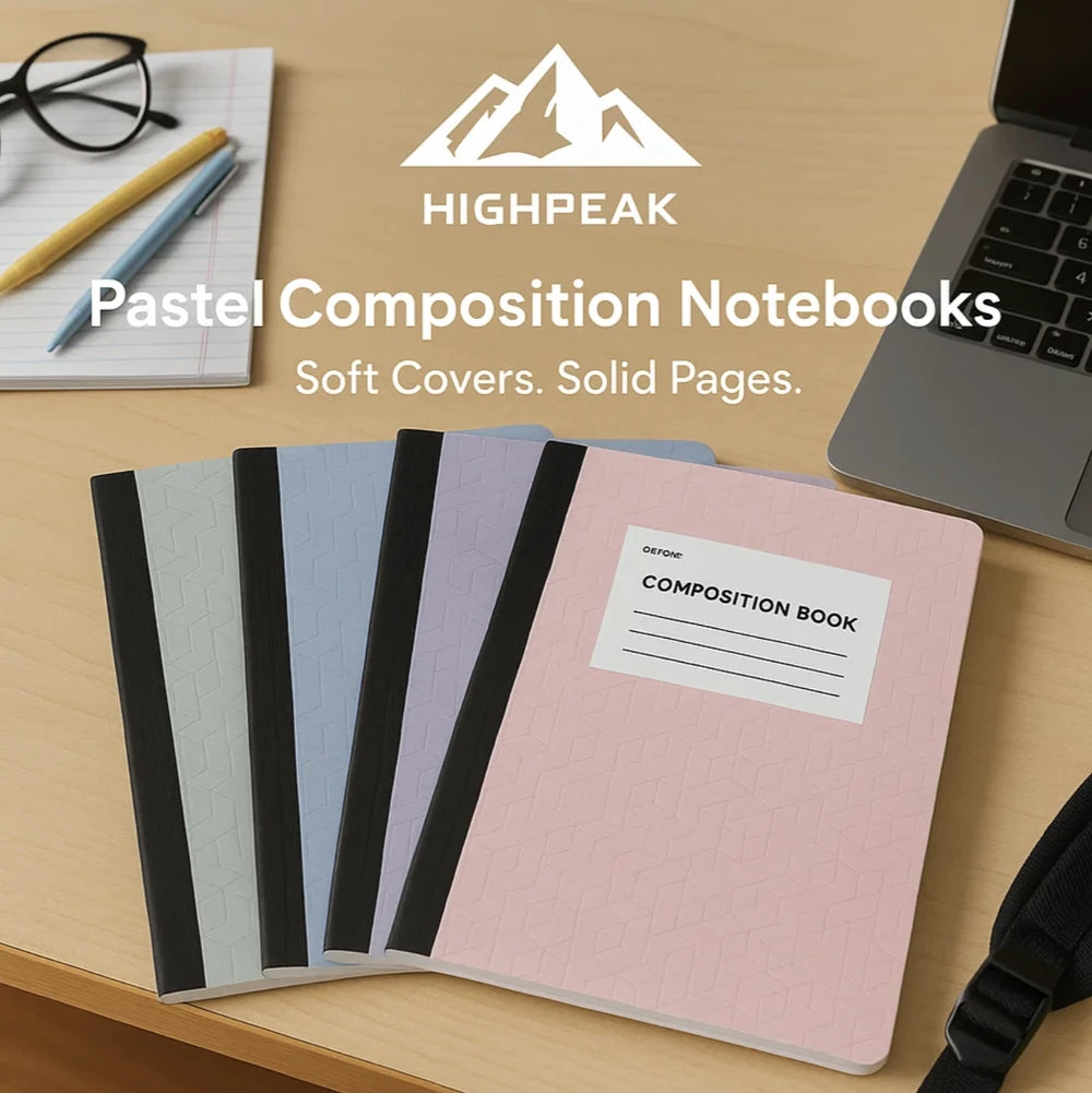 HighPeak Pastel Composition Notebooks 4-pack with wide-ruled pages, soft pastel covers, and stitched spines on wooden desk.