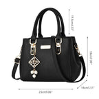 Pebbled Charm Shoulder Purse size guide: 23 cm wide, 14 cm deep, 18 cm high, with an 11.5 cm handle drop.