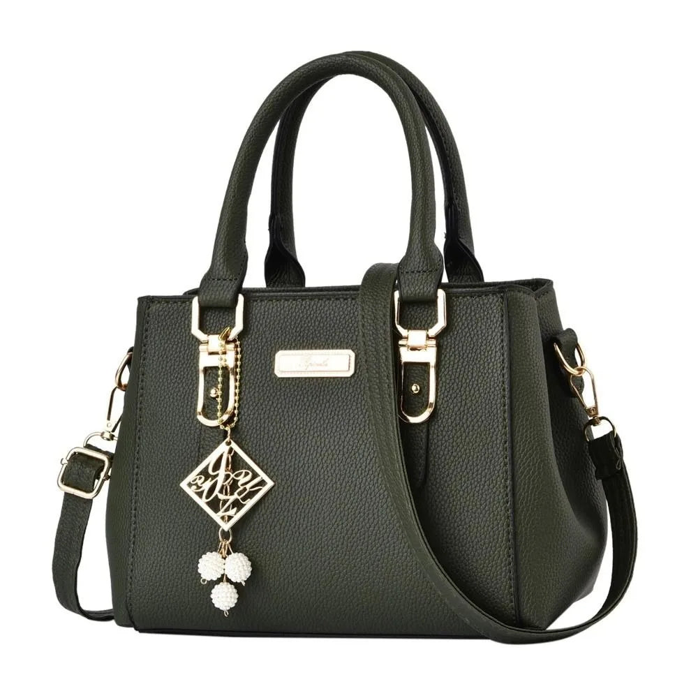 Pebbled Charm Shoulder Purse in green with pebbled texture, top handles and a long shoulder strap.