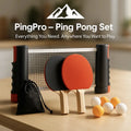 PingPro™ Portable Table Tennis Set with retractable net, two paddles, balls, and carry bag on a wooden table by HighPeak