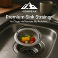 HighPeak Premium Sink Strainer in stainless steel with fine mesh catching food scraps in a kitchen sink drain.