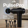 HighPeak PulsePro™ deep tissue massage gun in black with LED display and 10 attachments on a wooden floor background