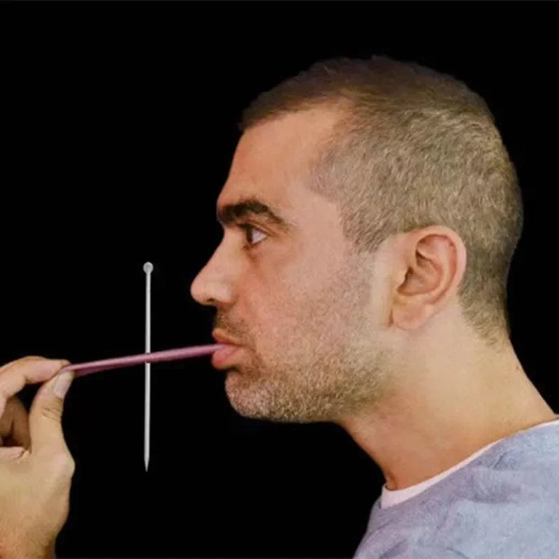Performer showing a fake tongue needle illusion; needle not included