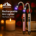 HighPeak Rechargeable Arc Lighter in rose gold and silver with flexible necks lighting candles indoors.