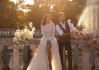 Supplier lifestyle photo of a couple celebrating outdoors; the woman wears a white bridal gown.