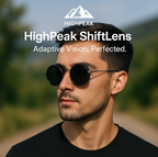 HighPeak ShiftLens sunglasses with round black lenses worn outdoors showcasing adaptive vision and sleek design