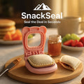 SnackSeal™ DIY Sandwich Cutter in pink on wood board with sealed sandwich, jam jar, and breakfast setup, HighPeak branding visible