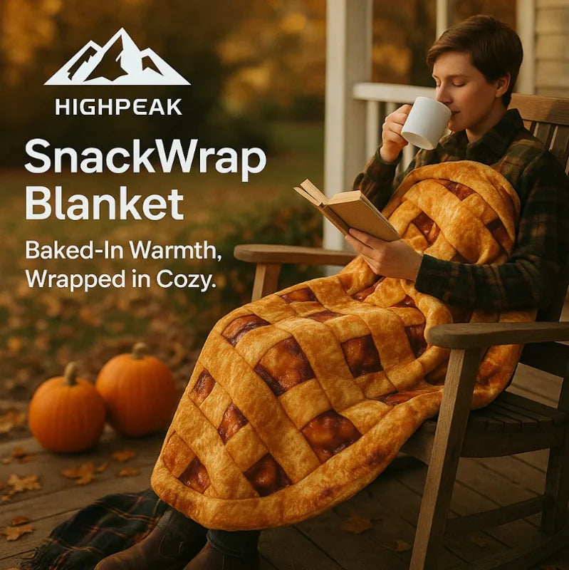 HighPeak Food Blanket in warm waffle print wrapped around person reading on porch with autumn pumpkins nearby