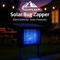 HighPeak Solar Bug Zapper with blue UV light glowing outdoors, solar powered, cordless, on stake in backyard at night