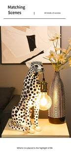 White Spotted Cheetah Premium Lamp with a glowing bulb beside a daisy-filled patterned vase in a styling graphic.