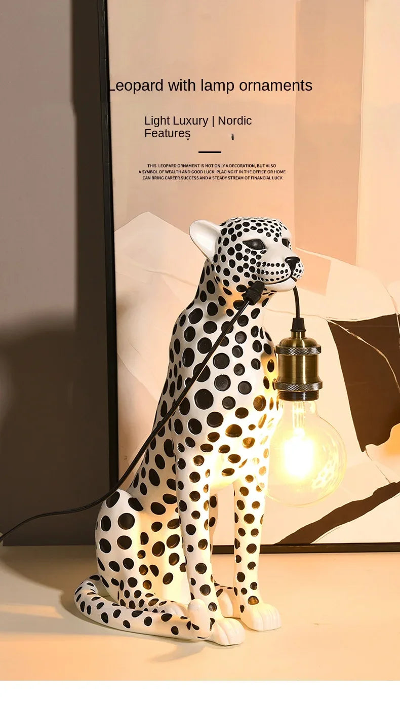White Spotted Cheetah Premium Lamp with a lit globe bulb and supplier lifestyle text over an abstract-art backdrop.