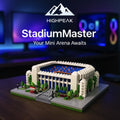 HighPeak StadiumMaster™ building block set showcasing a detailed white football stadium model on a wooden desk.