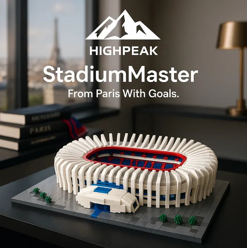 HighPeak StadiumMaster™ building block stadium model in white with blue and red seats displayed on a desk in a modern room