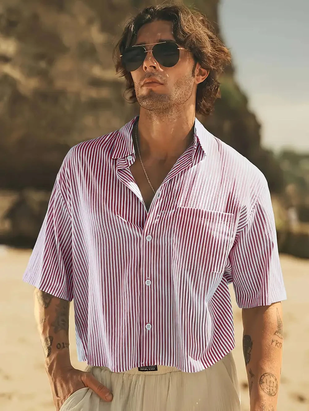 HighPeak Men’s Striped Beach Shirt in red and white stripes worn on a beach, lightweight breathable fabric with classic collar.