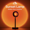 HighPeak Sunset Lamp projecting warm golden-hour light with sleek black stand on wooden surface indoors