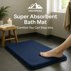 HighPeak Super Absorbent Bath Mat in navy blue on gray tile floor with foot stepping, showing soft, quick-dry, anti-slip features.