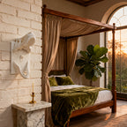 White T-Rex Skull Switch Cover on a brick wall beside a canopy bed
