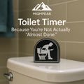 HighPeak Toilet Timer on white toilet tank with iconic silhouette design in neutral bathroom setting